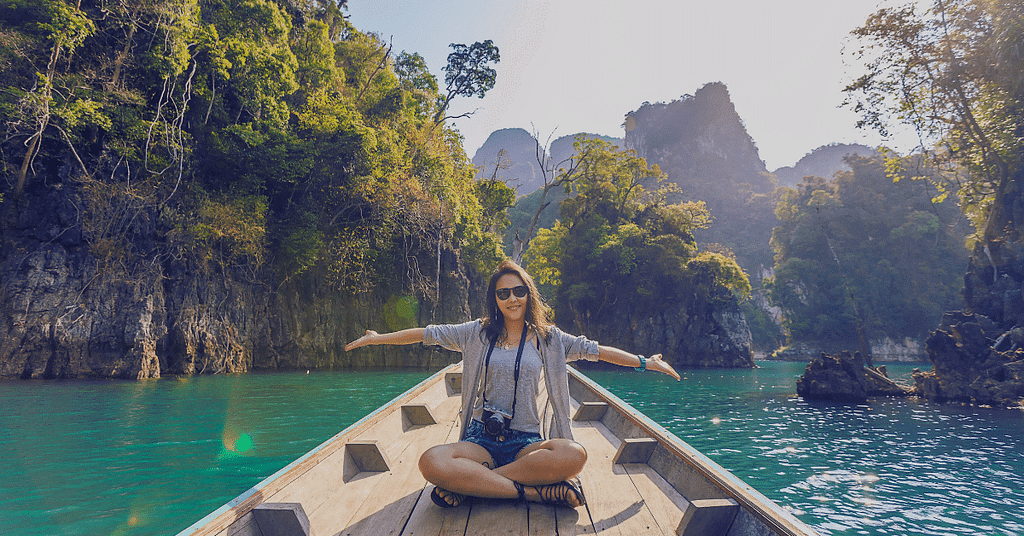 A girl in boat and enjoy her retirement in her early stage.