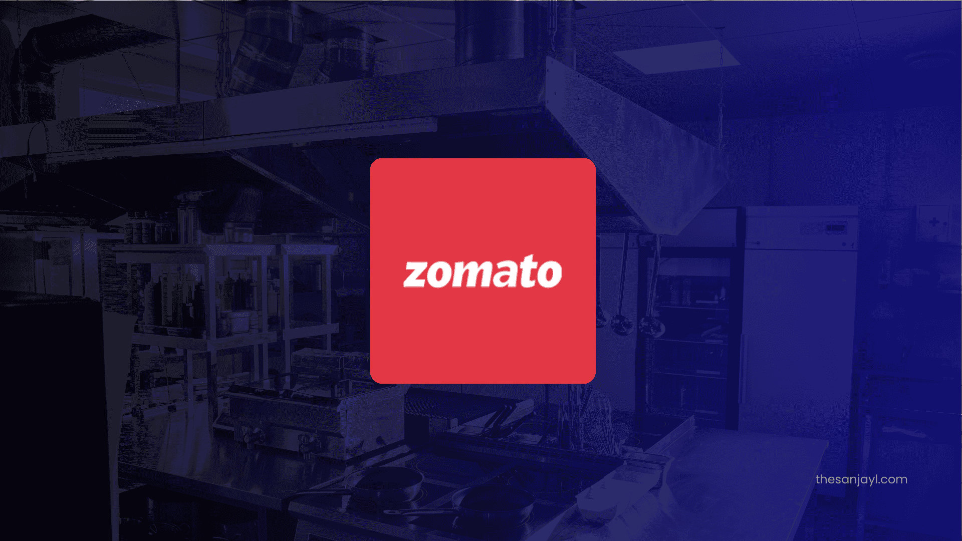 A Cloud kitchen background with low opacity with Zomato Log